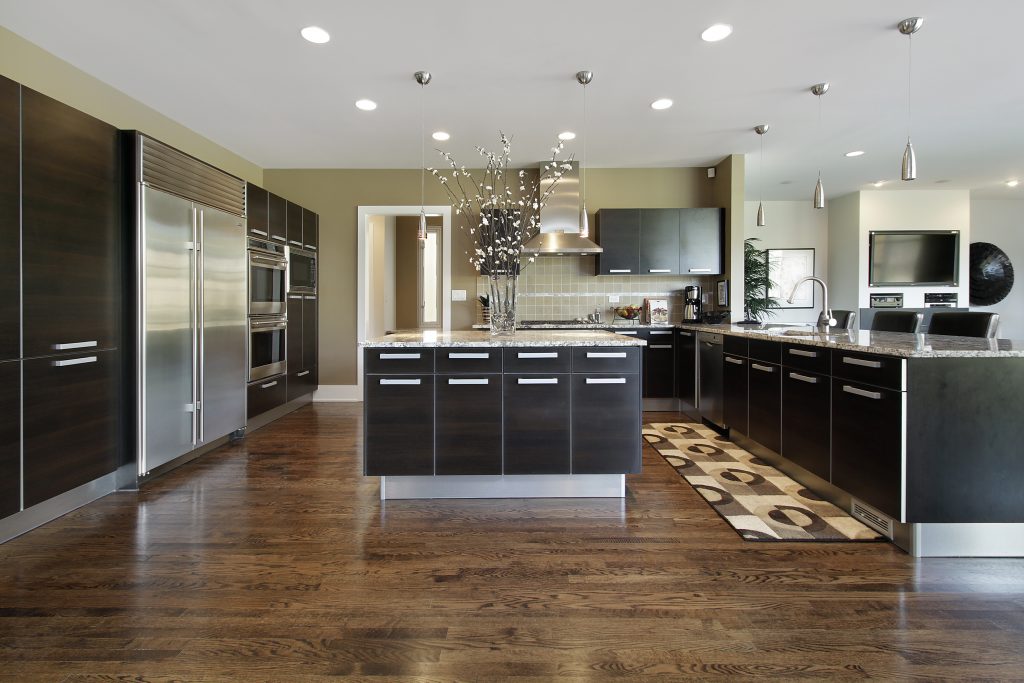 Custom kitchen remodeling with dark gray cabinets